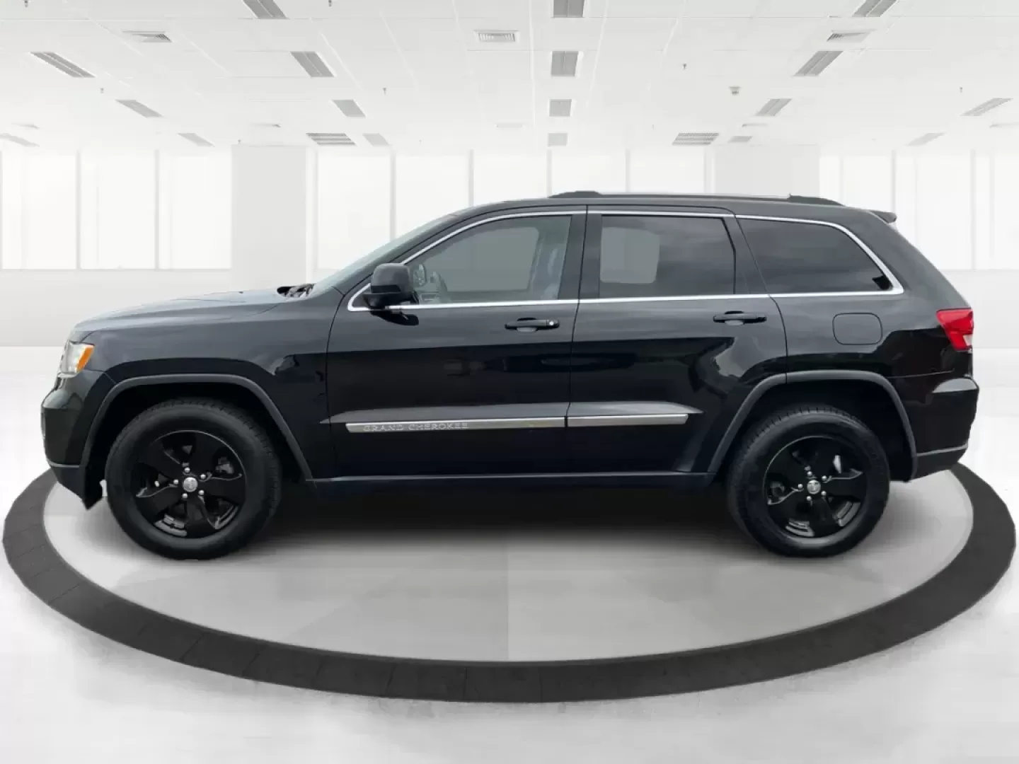 2013 Jeep Grand Cherokee Laredo (1C4RJFAGXDC) with an Other engine, located at 8750 N County Rd 25A, Piqua, OH, 45356, (937) 908-9800, 40.164391, -84.232513 - Photo#6