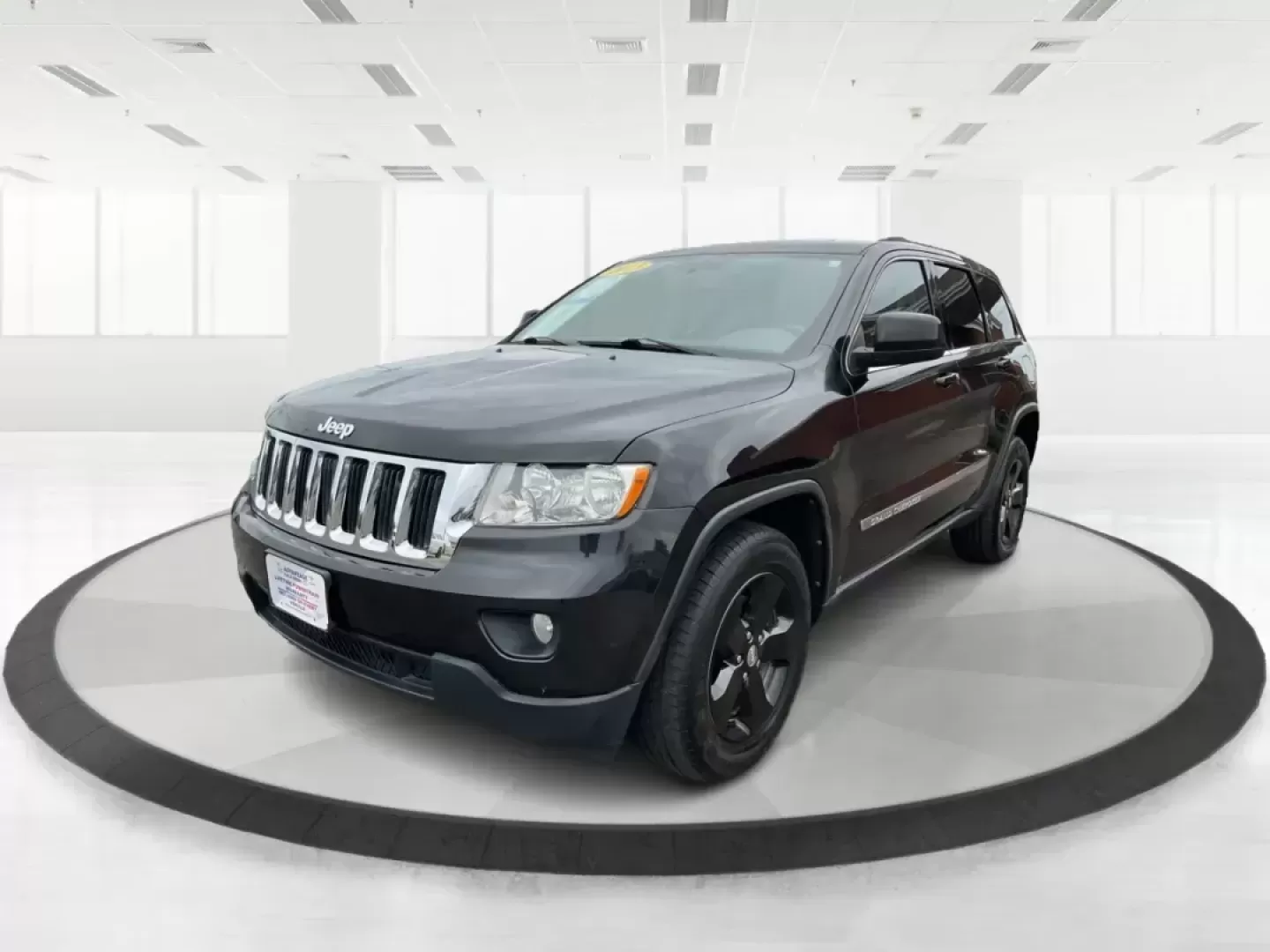 2013 Jeep Grand Cherokee Laredo (1C4RJFAGXDC) with an Other engine, located at 8750 N County Rd 25A, Piqua, OH, 45356, (937) 908-9800, 40.164391, -84.232513 - Photo#8