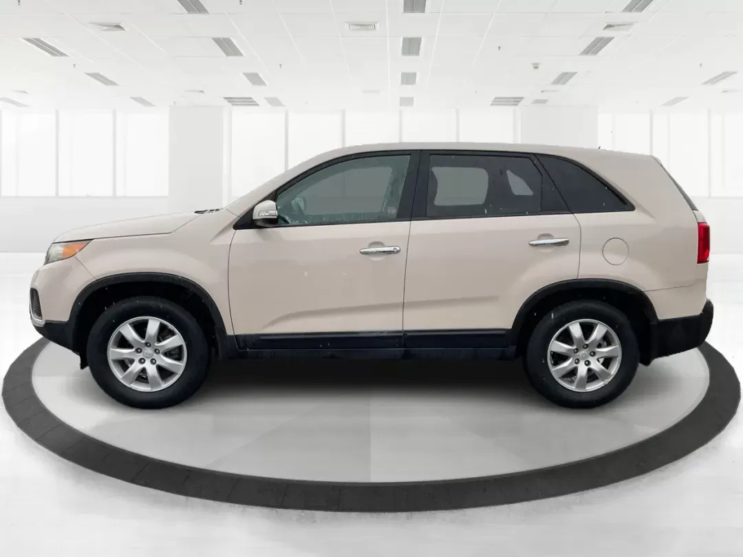 2011 Kia Sorento LX (5XYKT3A1XBG) with an 2.4L I-4 DOHC engine, located at 8750 N County Rd 25A, Piqua, OH, 45356, (937) 908-9800, 40.164391, -84.232513 - 2011 Kia Sorento LX - Photo#4