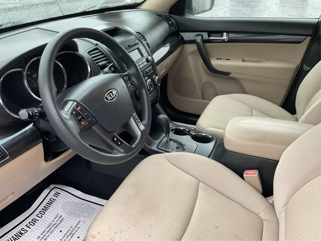 2011 Kia Sorento LX (5XYKT3A1XBG) with an 2.4L I-4 DOHC engine, located at 8750 N County Rd 25A, Piqua, OH, 45356, (937) 908-9800, 40.164391, -84.232513 - 2011 Kia Sorento LX - Photo#7