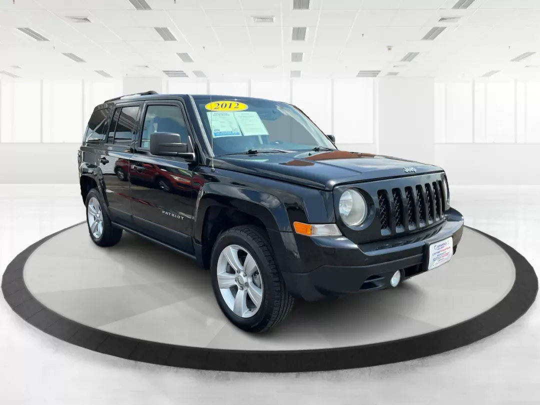 2012 Jeep Patriot Latitude (1C4NJRFB1CD) with an 2.4L I-4 DOHC engine, located at 1951 S Dayton Lakeview Rd., New Carlisle, OH, 45344, (937) 908-9800, 39.890999, -84.050255 - 2012 Jeep Patriot Latitude - Photo#0