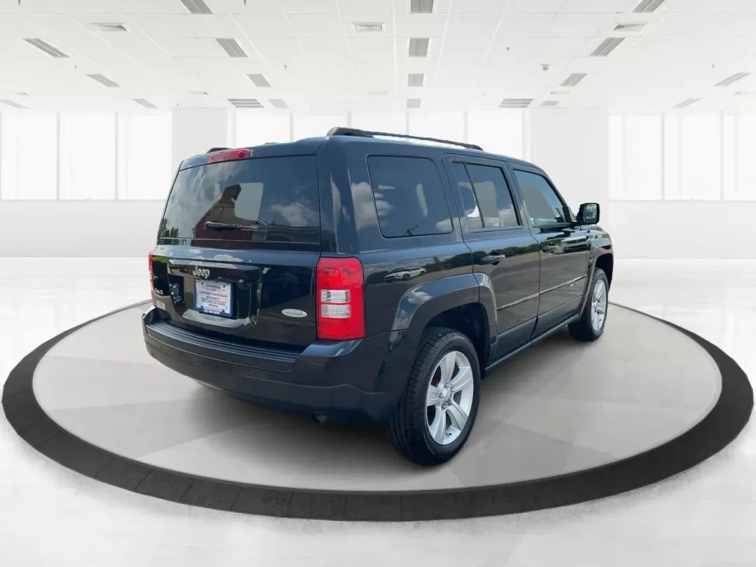 2012 Jeep Patriot Latitude (1C4NJRFB1CD) with an 2.4L I-4 DOHC engine, located at 1951 S Dayton Lakeview Rd., New Carlisle, OH, 45344, (937) 908-9800, 39.890999, -84.050255 - 2012 Jeep Patriot Latitude - Photo#2