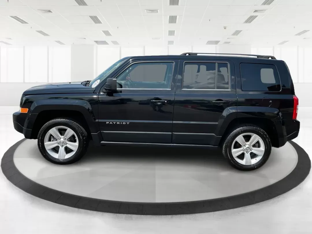 2012 Jeep Patriot Latitude (1C4NJRFB1CD) with an 2.4L I-4 DOHC engine, located at 1951 S Dayton Lakeview Rd., New Carlisle, OH, 45344, (937) 908-9800, 39.890999, -84.050255 - 2012 Jeep Patriot Latitude - Photo#5