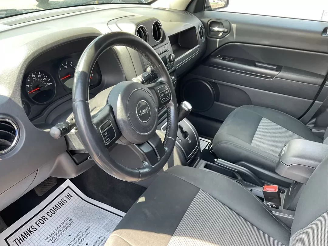 2012 Jeep Patriot Latitude (1C4NJRFB1CD) with an 2.4L I-4 DOHC engine, located at 1951 S Dayton Lakeview Rd., New Carlisle, OH, 45344, (937) 908-9800, 39.890999, -84.050255 - 2012 Jeep Patriot Latitude - Photo#8