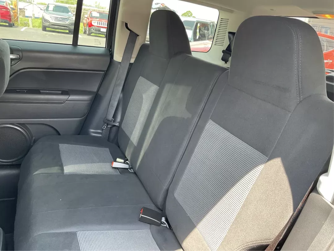 2012 Jeep Patriot Latitude (1C4NJRFB1CD) with an 2.4L I-4 DOHC engine, located at 1951 S Dayton Lakeview Rd., New Carlisle, OH, 45344, (937) 908-9800, 39.890999, -84.050255 - 2012 Jeep Patriot Latitude - Photo#9