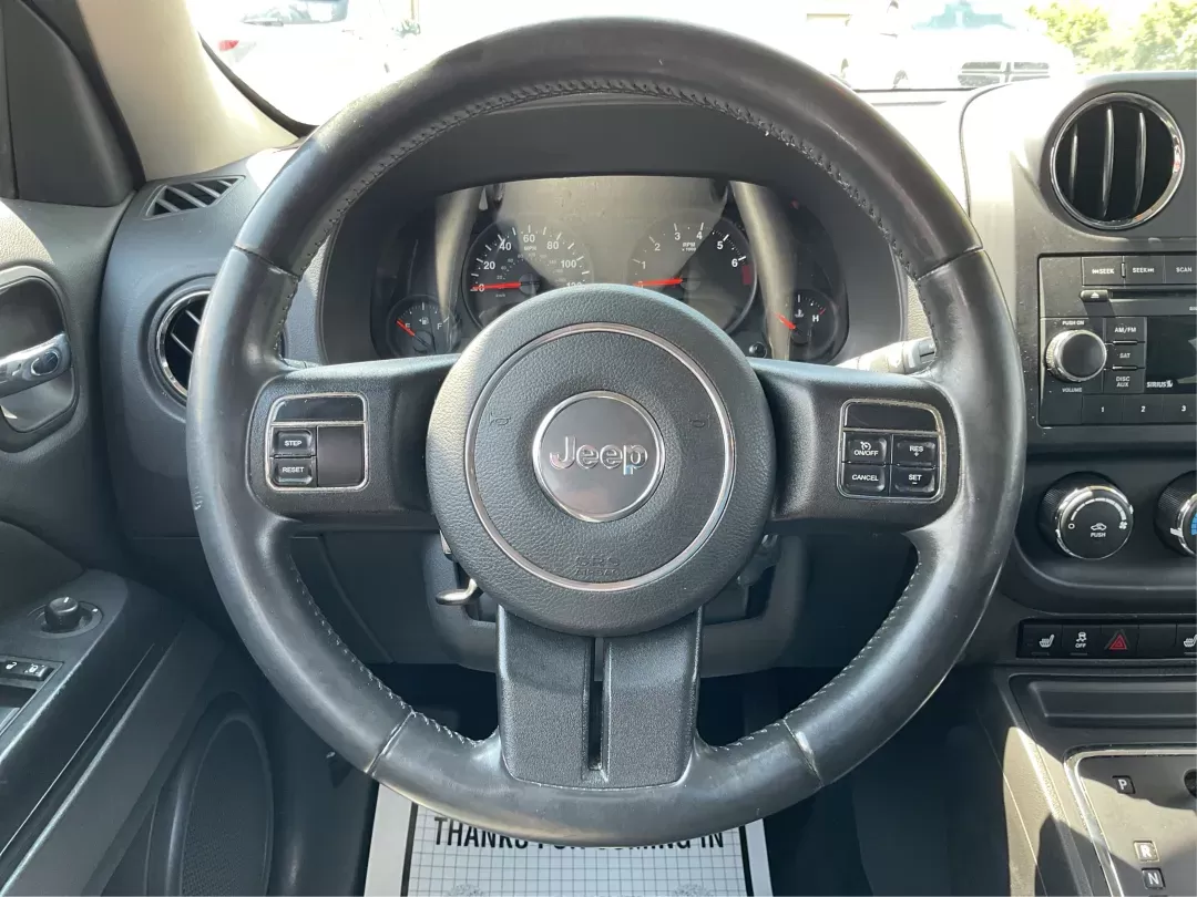 2012 Jeep Patriot Latitude (1C4NJRFB1CD) with an 2.4L I-4 DOHC engine, located at 1951 S Dayton Lakeview Rd., New Carlisle, OH, 45344, (937) 908-9800, 39.890999, -84.050255 - 2012 Jeep Patriot Latitude - Photo#15