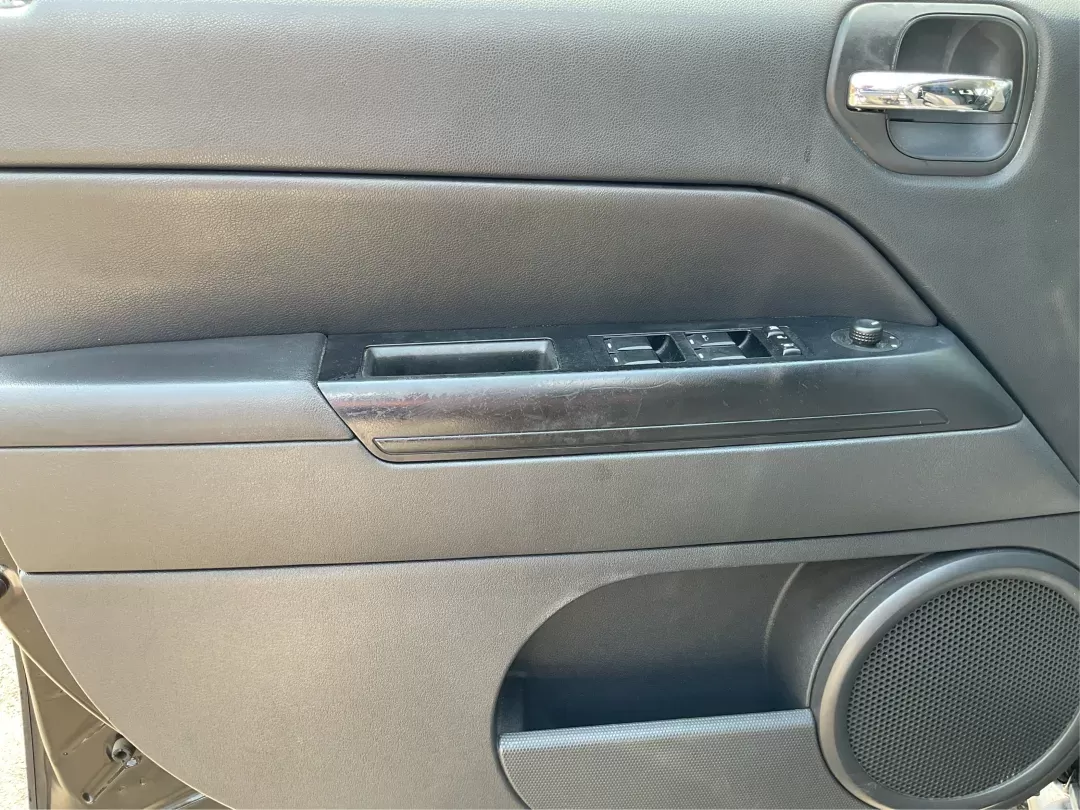 2012 Jeep Patriot Latitude (1C4NJRFB1CD) with an 2.4L I-4 DOHC engine, located at 1951 S Dayton Lakeview Rd., New Carlisle, OH, 45344, (937) 908-9800, 39.890999, -84.050255 - 2012 Jeep Patriot Latitude - Photo#16
