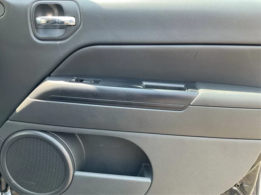 2012 Jeep Patriot Latitude (1C4NJRFB1CD) with an 2.4L I-4 DOHC engine, located at 1951 S Dayton Lakeview Rd., New Carlisle, OH, 45344, (937) 908-9800, 39.890999, -84.050255 - 2012 Jeep Patriot Latitude - Photo#17