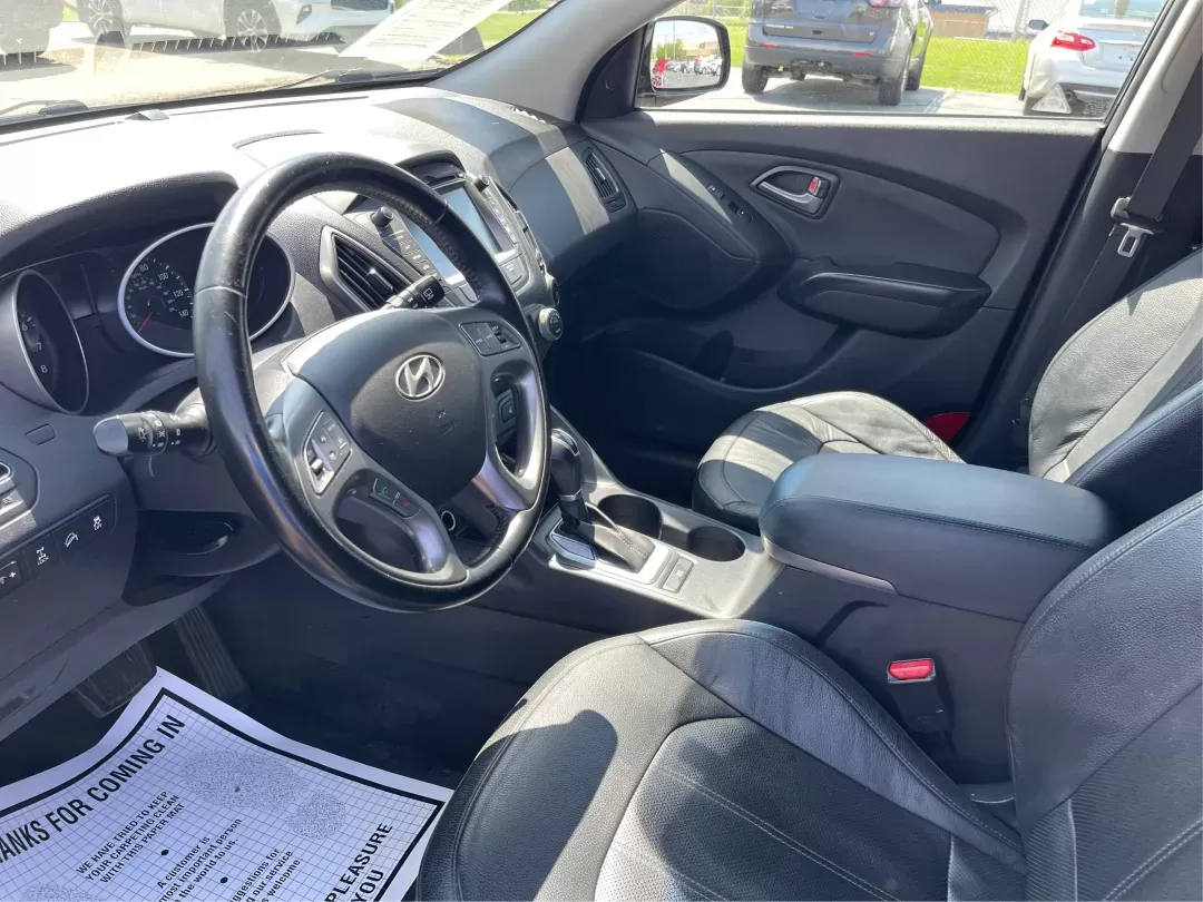 2015 Hyundai Tucson Limited (KM8JUCAG0FU) with an Theta II 2.4L I-4 gasoline direct injection engine, located at 401 Woodman Dr, Riverside, OH, 45431, (937) 908-9800, 39.760899, -84.123421 - 2015 Hyundai Tucson Limited - Photo#8