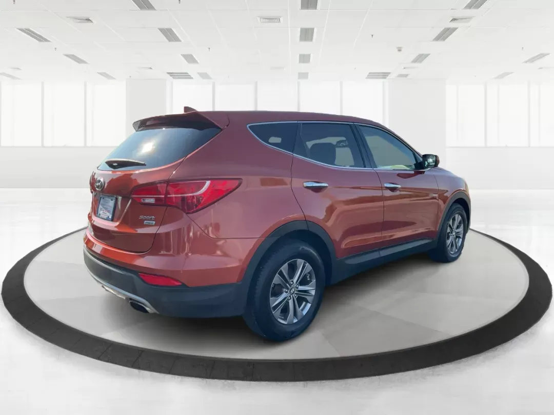 2013 Hyundai Santa Fe Sport (5XYZTDLB7DG) with an Theta II 2.4L I-4 gasoline direct injection engine, located at 880 E. National Road, Vandalia, OH, 45377, (937) 908-9800, 39.891918, -84.183594 - 2013 Hyundai Santa Fe Sport - Photo#2
