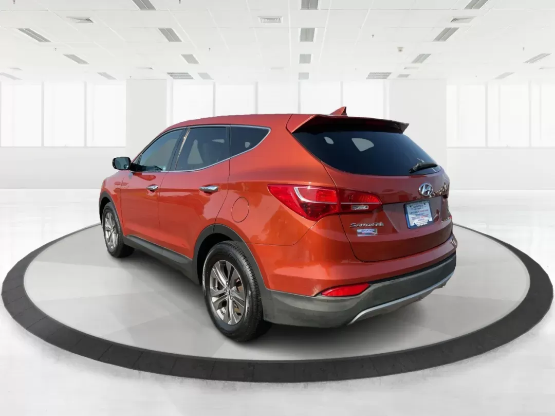 2013 Hyundai Santa Fe Sport (5XYZTDLB7DG) with an Theta II 2.4L I-4 gasoline direct injection engine, located at 880 E. National Road, Vandalia, OH, 45377, (937) 908-9800, 39.891918, -84.183594 - 2013 Hyundai Santa Fe Sport - Photo#4