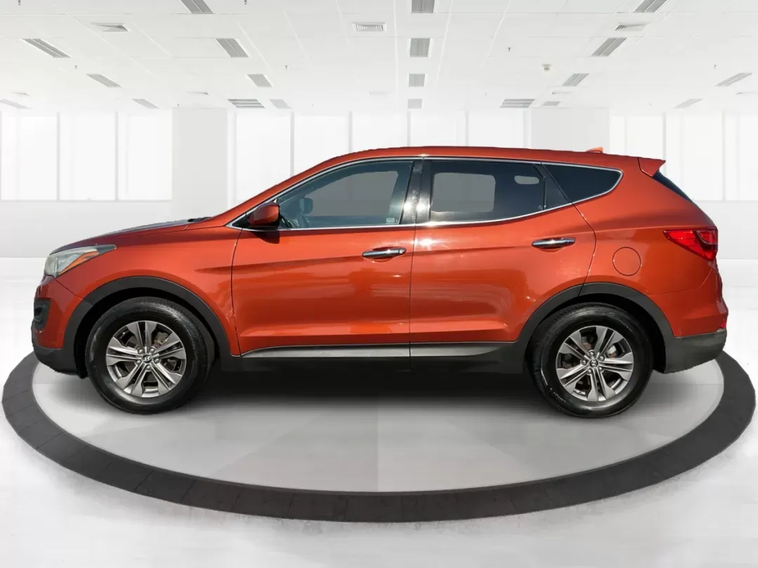 2013 Hyundai Santa Fe Sport (5XYZTDLB7DG) with an Theta II 2.4L I-4 gasoline direct injection engine, located at 880 E. National Road, Vandalia, OH, 45377, (937) 908-9800, 39.891918, -84.183594 - 2013 Hyundai Santa Fe Sport - Photo#5