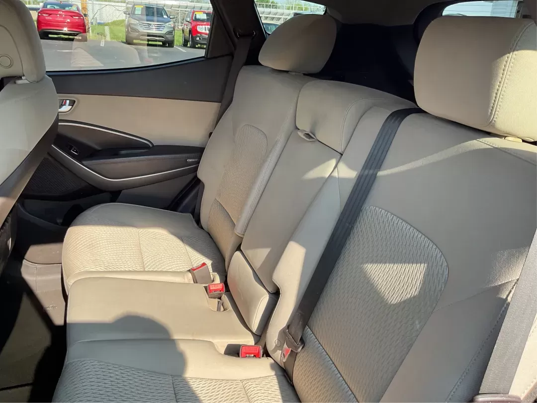 2013 Hyundai Santa Fe Sport (5XYZTDLB7DG) with an Theta II 2.4L I-4 gasoline direct injection engine, located at 880 E. National Road, Vandalia, OH, 45377, (937) 908-9800, 39.891918, -84.183594 - 2013 Hyundai Santa Fe Sport - Photo#9