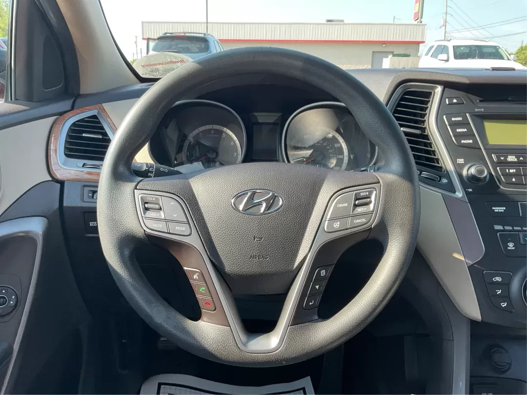 2013 Hyundai Santa Fe Sport (5XYZTDLB7DG) with an Theta II 2.4L I-4 gasoline direct injection engine, located at 880 E. National Road, Vandalia, OH, 45377, (937) 908-9800, 39.891918, -84.183594 - 2013 Hyundai Santa Fe Sport - Photo#15
