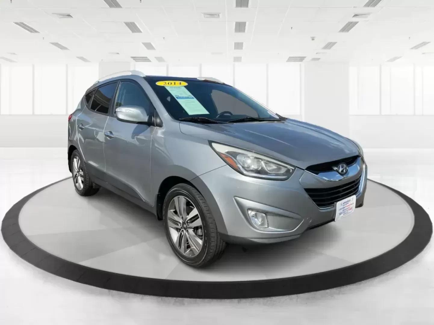 2014 Hyundai Tucson Limited (KM8JUCAG9EU) with an Theta II 2.4L I-4 gasoline direct injection engine, located at 8750 N County Rd 25A, Piqua, OH, 45356, (937) 908-9800, 40.164391, -84.232513 - Photo#0