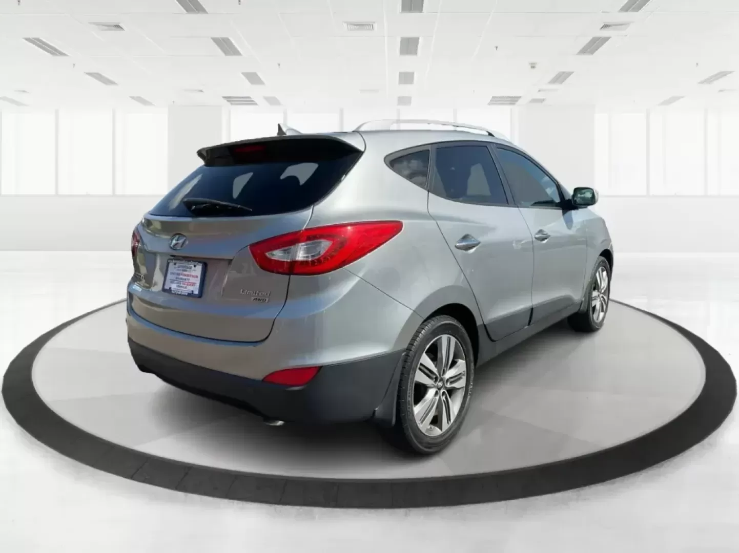 2014 Hyundai Tucson Limited (KM8JUCAG9EU) with an Theta II 2.4L I-4 gasoline direct injection engine, located at 8750 N County Rd 25A, Piqua, OH, 45356, (937) 908-9800, 40.164391, -84.232513 - Photo#1