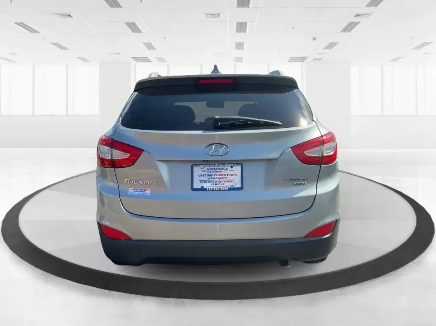 2014 Hyundai Tucson Limited (KM8JUCAG9EU) with an Theta II 2.4L I-4 gasoline direct injection engine, located at 8750 N County Rd 25A, Piqua, OH, 45356, (937) 908-9800, 40.164391, -84.232513 - Photo#2