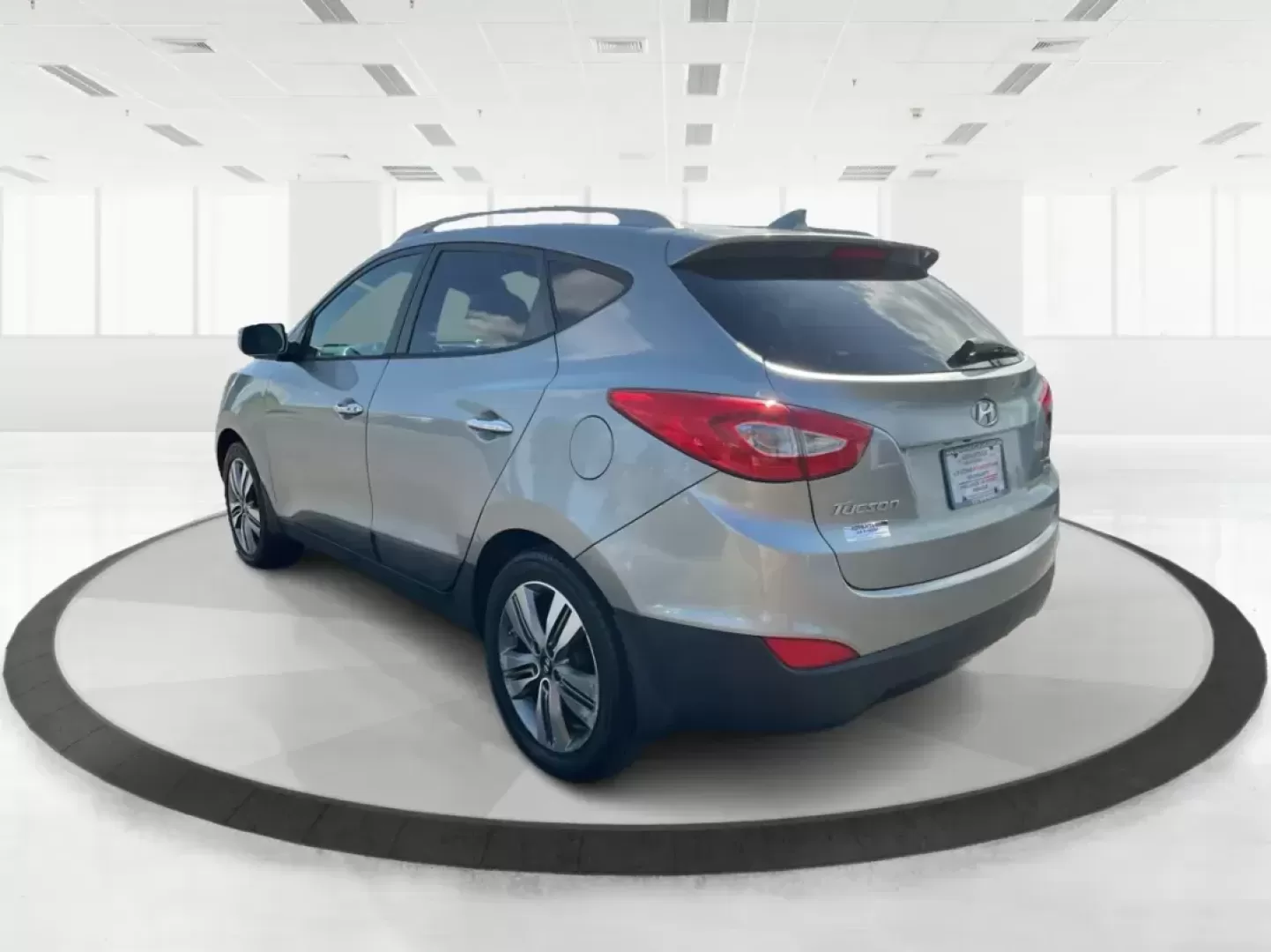 2014 Hyundai Tucson Limited (KM8JUCAG9EU) with an Theta II 2.4L I-4 gasoline direct injection engine, located at 8750 N County Rd 25A, Piqua, OH, 45356, (937) 908-9800, 40.164391, -84.232513 - Photo#4