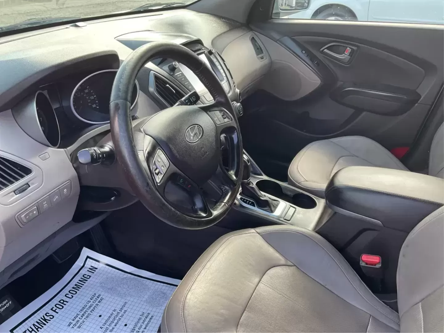 2014 Hyundai Tucson Limited (KM8JUCAG9EU) with an Theta II 2.4L I-4 gasoline direct injection engine, located at 8750 N County Rd 25A, Piqua, OH, 45356, (937) 908-9800, 40.164391, -84.232513 - Photo#8