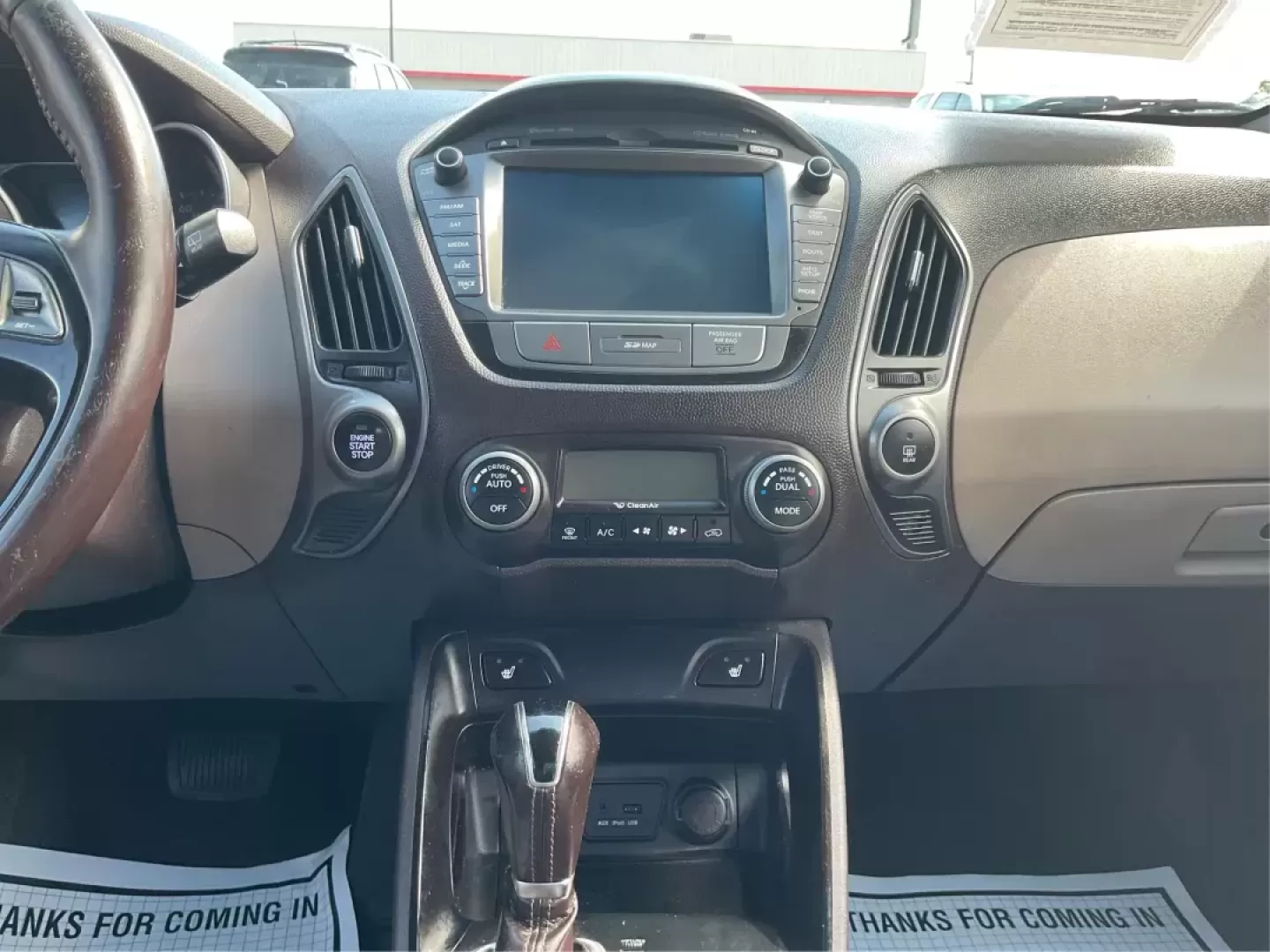 2014 Hyundai Tucson Limited (KM8JUCAG9EU) with an Theta II 2.4L I-4 gasoline direct injection engine, located at 8750 N County Rd 25A, Piqua, OH, 45356, (937) 908-9800, 40.164391, -84.232513 - Photo#12