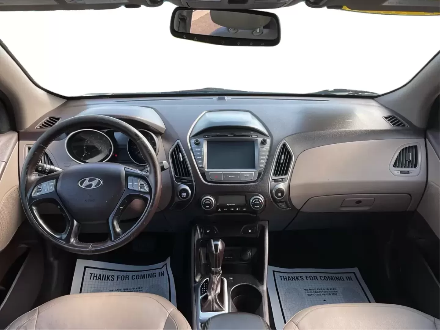 2014 Hyundai Tucson Limited (KM8JUCAG9EU) with an Theta II 2.4L I-4 gasoline direct injection engine, located at 8750 N County Rd 25A, Piqua, OH, 45356, (937) 908-9800, 40.164391, -84.232513 - Photo#19
