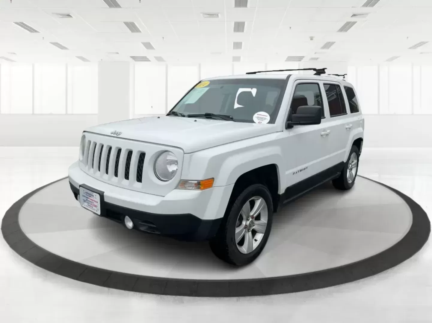 2014 Jeep Patriot Latitude (1C4NJRFB4ED) with an 2.4L I-4 DOHC engine, located at 1230 East Main St, Xenia, OH, 45385, (937) 908-9800, 39.688026, -83.910172 - Photo#7