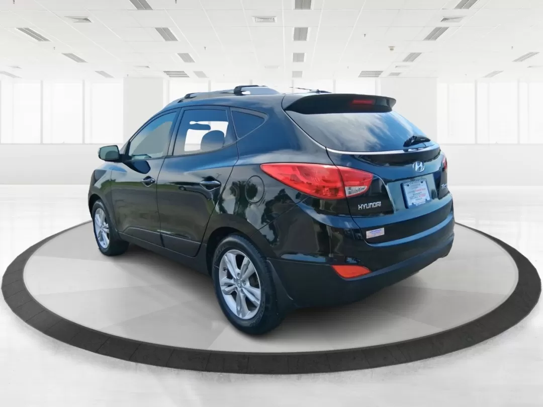 2012 Hyundai Tucson GLS (KM8JU3AC2CU) with an Theta II 2.4L I-4 DOHC engine, located at 880 E. National Road, Vandalia, OH, 45377, (937) 908-9800, 39.891918, -84.183594 - Photo#4