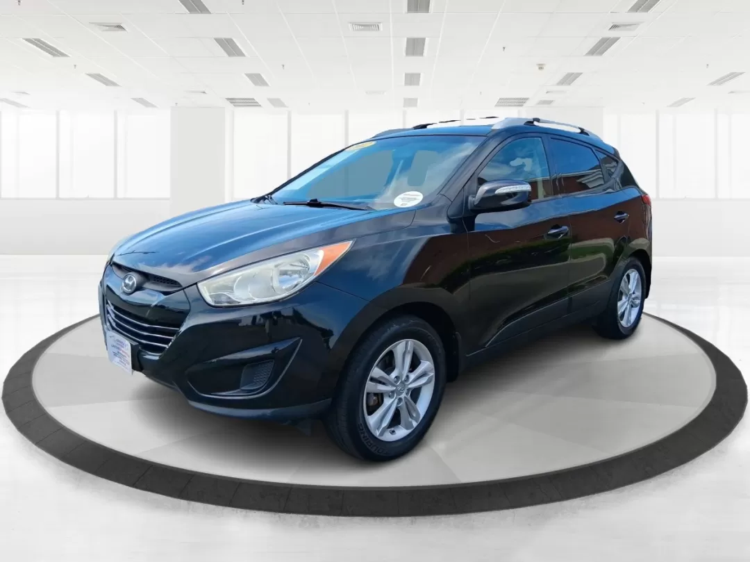 2012 Hyundai Tucson GLS (KM8JU3AC2CU) with an Theta II 2.4L I-4 DOHC engine, located at 880 E. National Road, Vandalia, OH, 45377, (937) 908-9800, 39.891918, -84.183594 - Photo#8
