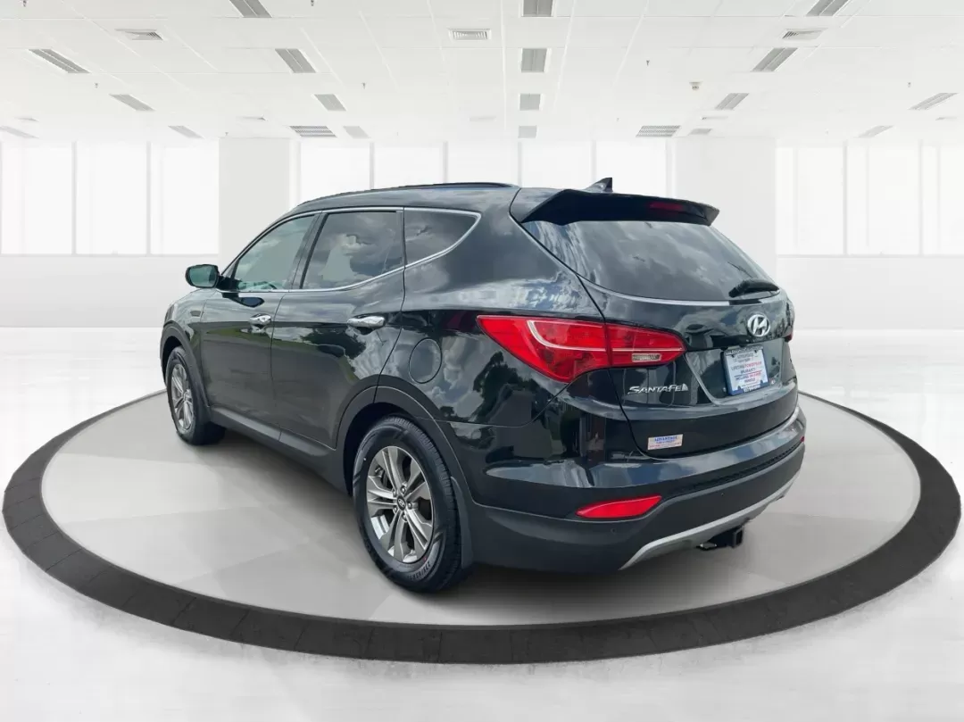 2015 Hyundai Santa Fe Sport 2.4L (5XYZUDLB2FG) with an Theta II 2.4L I-4 gasoline direct injection engine, located at 8750 N County Rd 25A, Piqua, OH, 45356, (937) 908-9800, 40.164391, -84.232513 - 2015 Hyundai Santa Fe Sport 2.4L - Photo#4