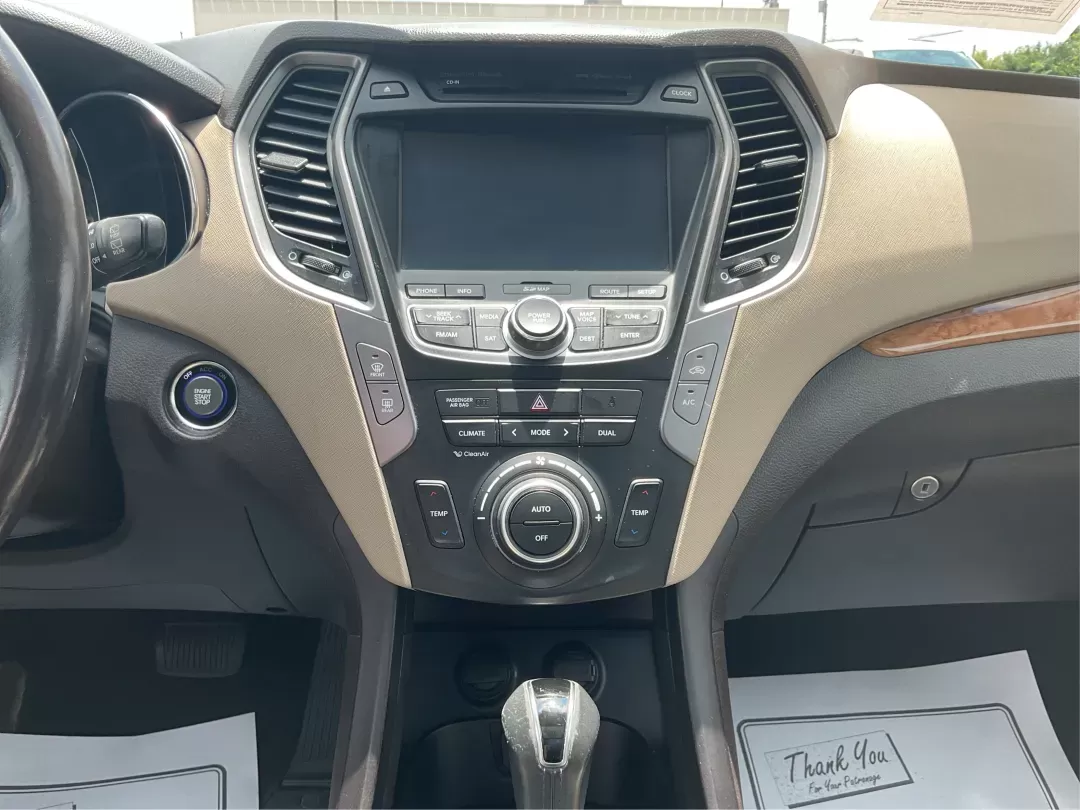 2015 Hyundai Santa Fe Sport 2.4L (5XYZUDLB2FG) with an Theta II 2.4L I-4 gasoline direct injection engine, located at 8750 N County Rd 25A, Piqua, OH, 45356, (937) 908-9800, 40.164391, -84.232513 - 2015 Hyundai Santa Fe Sport 2.4L - Photo#12