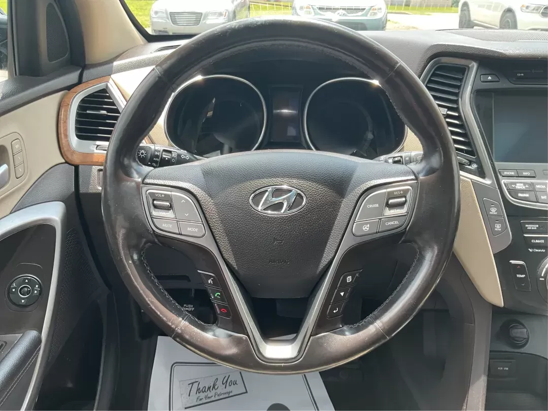 2015 Hyundai Santa Fe Sport 2.4L (5XYZUDLB2FG) with an Theta II 2.4L I-4 gasoline direct injection engine, located at 8750 N County Rd 25A, Piqua, OH, 45356, (937) 908-9800, 40.164391, -84.232513 - 2015 Hyundai Santa Fe Sport 2.4L - Photo#15
