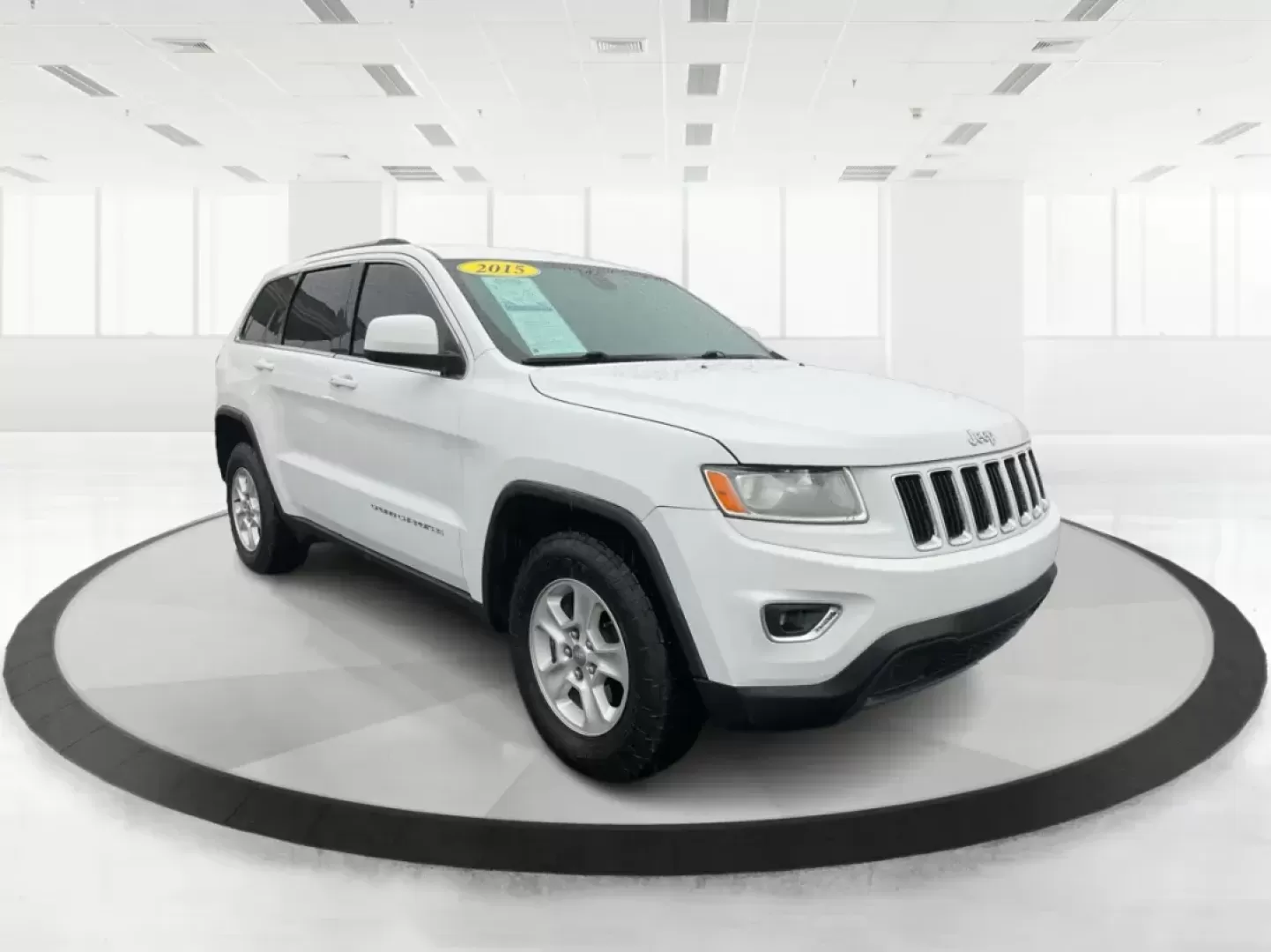 2015 Jeep Grand Cherokee Laredo (1C4RJFAG7FC) with an 3.6L V-6 DOHC engine, located at 8750 N County Rd 25A, Piqua, OH, 45356, (937) 908-9800, 40.164391, -84.232513 - Photo#0