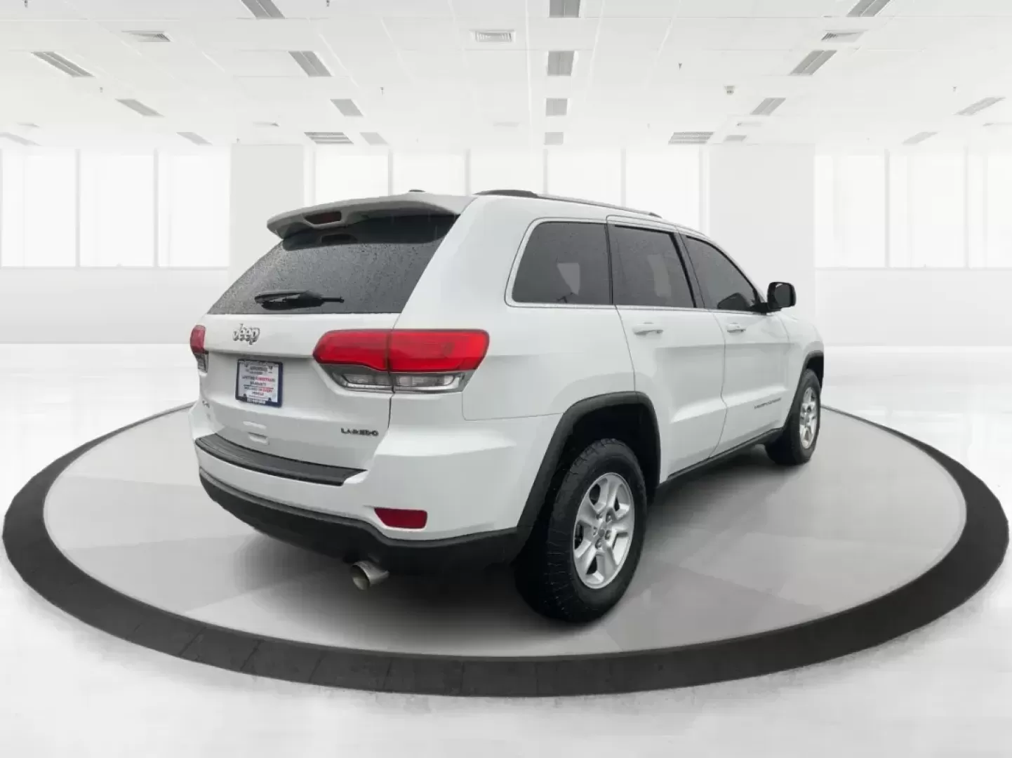 2015 Jeep Grand Cherokee Laredo (1C4RJFAG7FC) with an 3.6L V-6 DOHC engine, located at 8750 N County Rd 25A, Piqua, OH, 45356, (937) 908-9800, 40.164391, -84.232513 - Photo#2