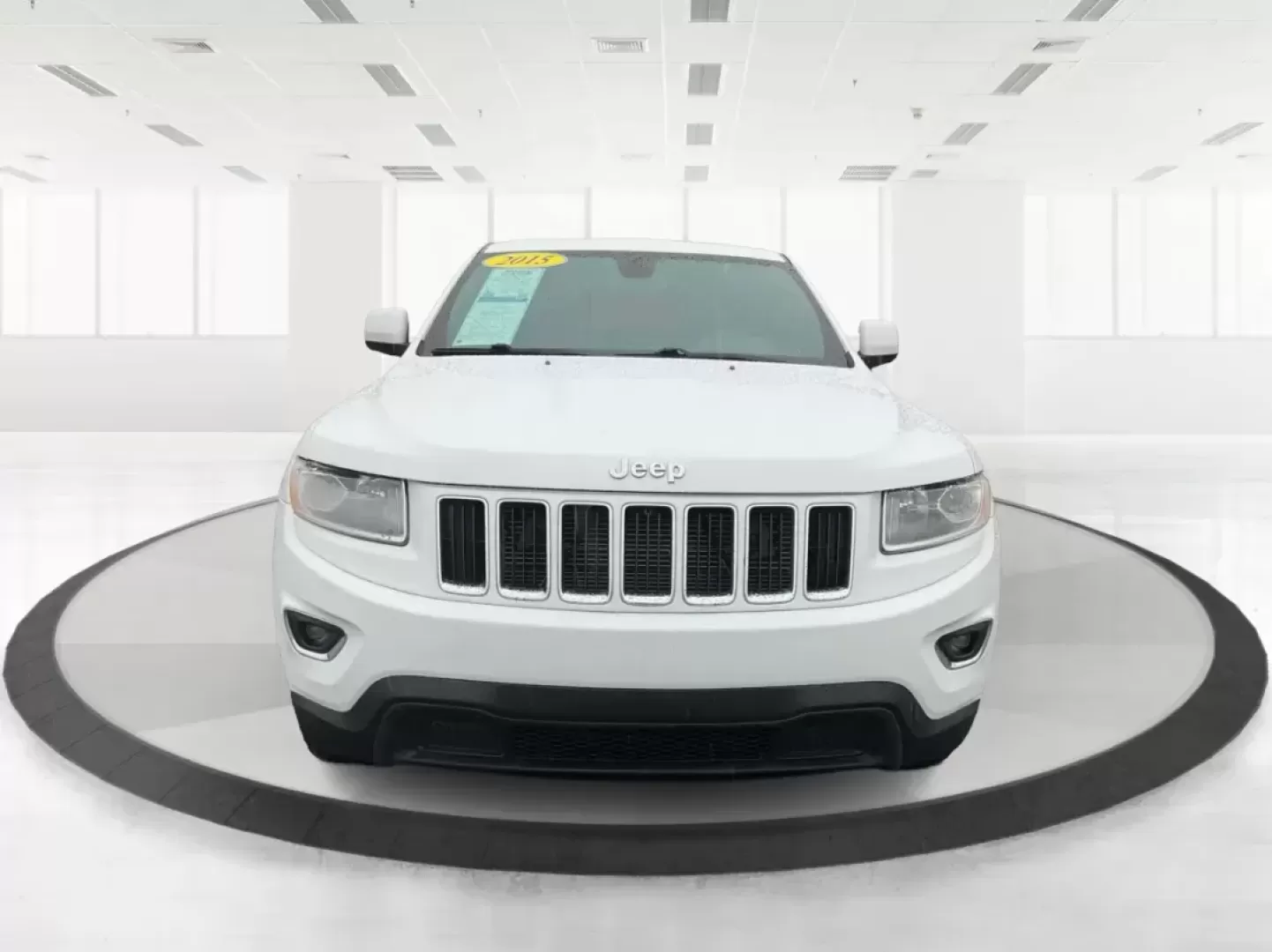 2015 Jeep Grand Cherokee Laredo (1C4RJFAG7FC) with an 3.6L V-6 DOHC engine, located at 8750 N County Rd 25A, Piqua, OH, 45356, (937) 908-9800, 40.164391, -84.232513 - Photo#6