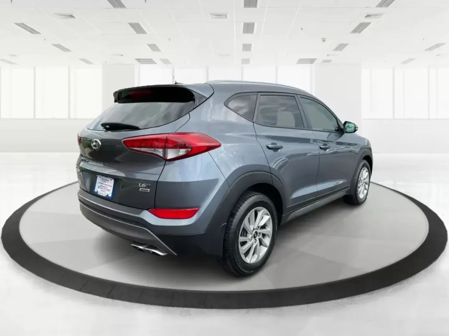 2016 Hyundai Tucson Eco (KM8J3CA24GU) with an 1.6L I-4 gasoline direct injection engine, located at 8750 N County Rd 25A, Piqua, OH, 45356, (937) 908-9800, 40.164391, -84.232513 - 2016 Hyundai Tucson Eco - Photo#2