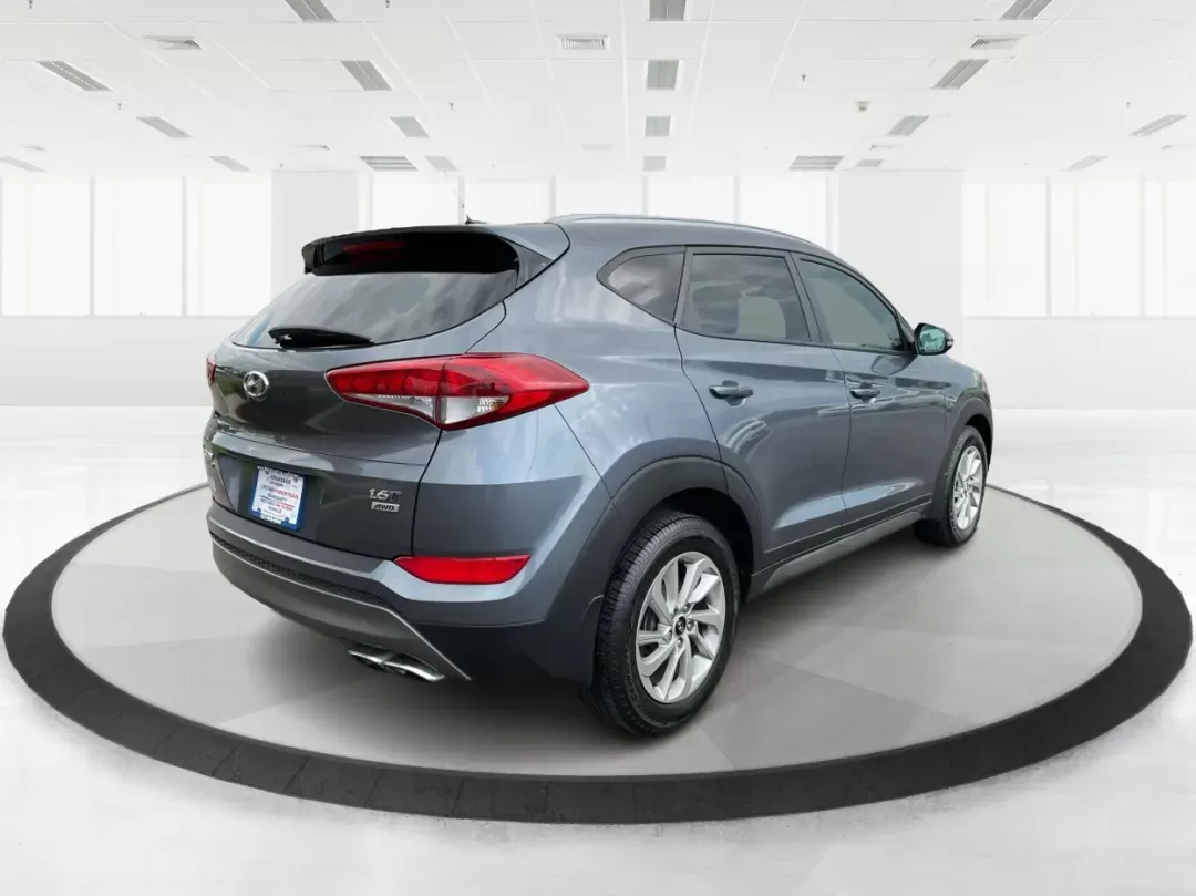 2016 Hyundai Tucson Eco (KM8J3CA24GU) with an 1.6L I-4 gasoline direct injection engine, located at 8750 N County Rd 25A, Piqua, OH, 45356, (937) 908-9800, 40.164391, -84.232513 - 2016 Hyundai Tucson Eco - Photo#2