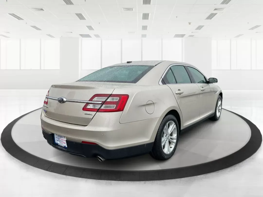 2017 Ford Taurus SEL (1FAHP2E86HG) with an EcoBoost 2L I-4 gasoline direct injection engine, located at 4508 South Dixie Dr, Moraine, OH, 45439, (937) 908-9800, 39.689976, -84.218452 - 2017 Ford Taurus SEL - Photo#2