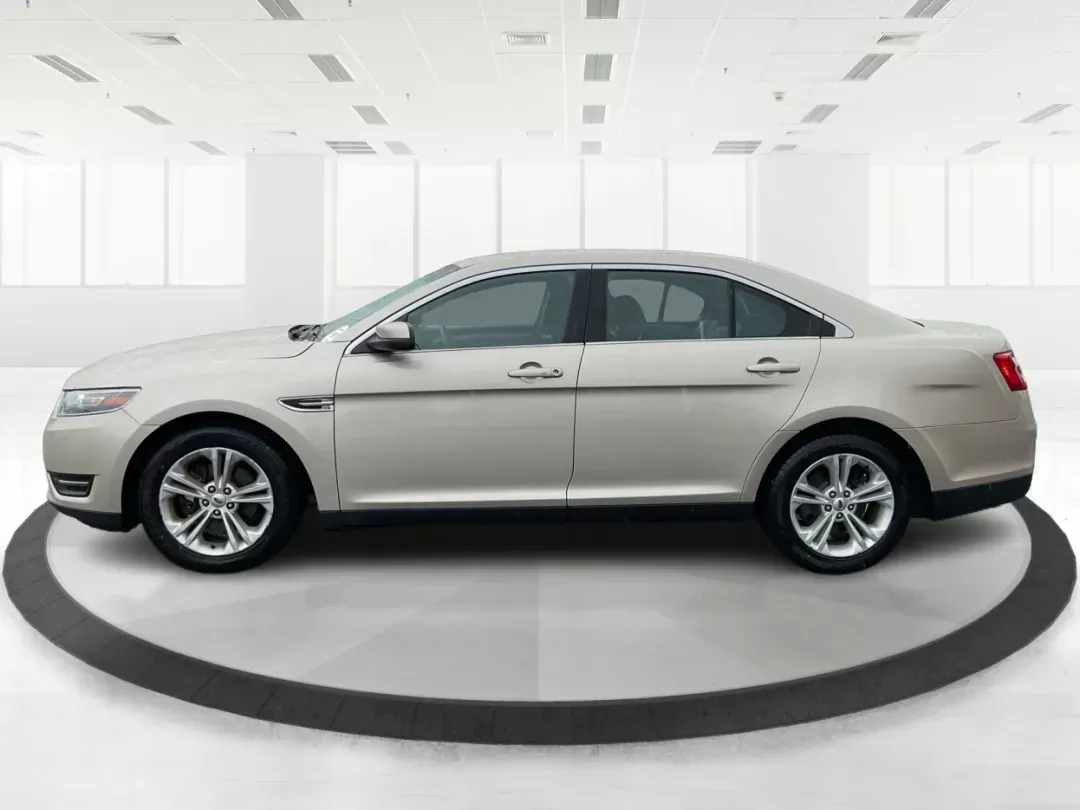2017 Ford Taurus SEL (1FAHP2E86HG) with an EcoBoost 2L I-4 gasoline direct injection engine, located at 4508 South Dixie Dr, Moraine, OH, 45439, (937) 908-9800, 39.689976, -84.218452 - 2017 Ford Taurus SEL - Photo#5