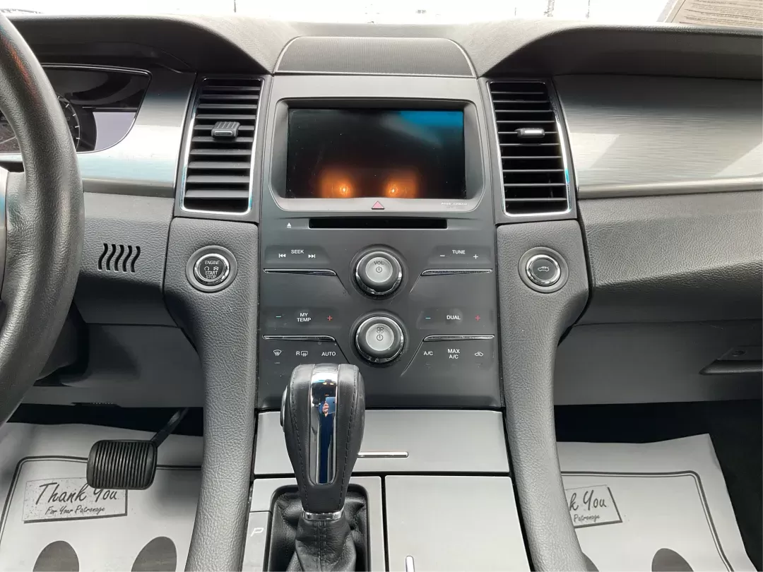 2017 Ford Taurus SEL (1FAHP2E86HG) with an EcoBoost 2L I-4 gasoline direct injection engine, located at 4508 South Dixie Dr, Moraine, OH, 45439, (937) 908-9800, 39.689976, -84.218452 - 2017 Ford Taurus SEL - Photo#11