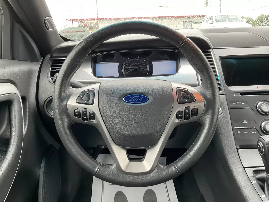 2017 Ford Taurus SEL (1FAHP2E86HG) with an EcoBoost 2L I-4 gasoline direct injection engine, located at 4508 South Dixie Dr, Moraine, OH, 45439, (937) 908-9800, 39.689976, -84.218452 - 2017 Ford Taurus SEL - Photo#14