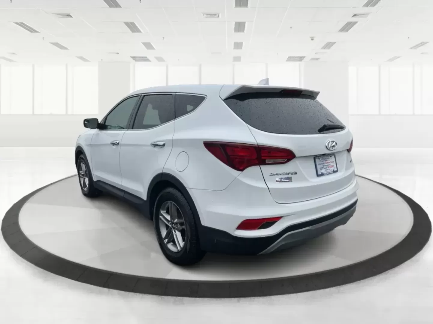 2017 Hyundai Santa Fe Sport 2.4L (5NMZT3LB8HH) with an Theta II 2.4L I-4 gasoline direct injection engine, located at 1184 Kauffman Ave, Fairborn, OH, 45324, (937) 908-9800, 39.807072, -84.030914 - 2017 Hyundai Santa Fe Sport 2.4L - Photo#4