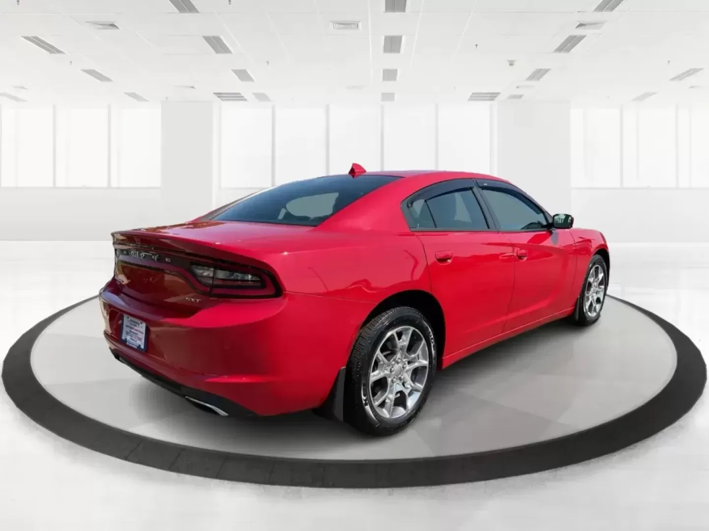 2015 Dodge Charger SXT (2C3CDXJG7FH) with an 3.6L V-6 DOHC engine, located at 8750 N County Rd 25A, Piqua, OH, 45356, (937) 908-9800, 40.164391, -84.232513 - Photo#2
