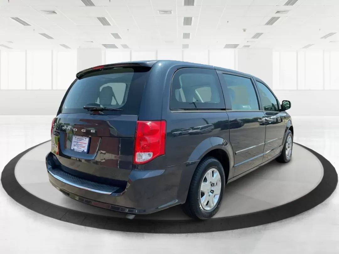2013 Dodge Grand Caravan SE (2C4RDGBG2DR) with an 3.6L V6 DOHC 24V engine, 6-Speed Automatic transmission, located at 401 Woodman Dr, Riverside, OH, 45431, (937) 908-9800, 39.760899, -84.123421 - 2013 Dodge Grand Caravan SE - Photo#2