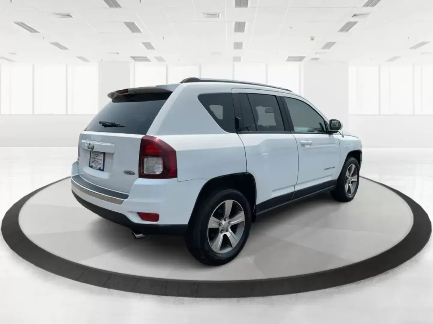 2016 Jeep Compass High Altitude Edition (1C4NJDEB9GD) with an 2.4L I-4 DOHC engine, located at 1230 East Main St, Xenia, OH, 45385, (937) 908-9800, 39.688026, -83.910172 - 2016 Jeep Compass High Altitude Edition - Photo#2
