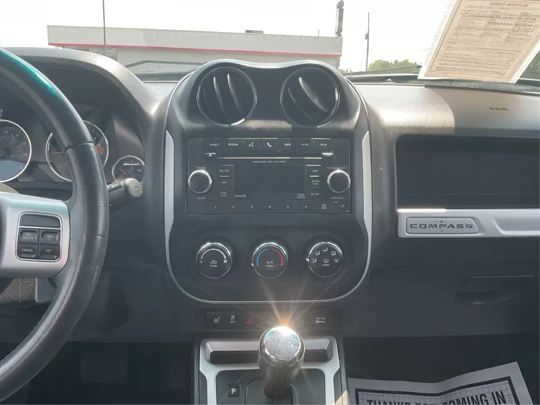 2016 Jeep Compass High Altitude Edition (1C4NJDEB2GD) with an 2.4L I-4 DOHC engine, located at 880 E. National Road, Vandalia, OH, 45377, (937) 908-9800, 39.891918, -84.183594 - Photo#11