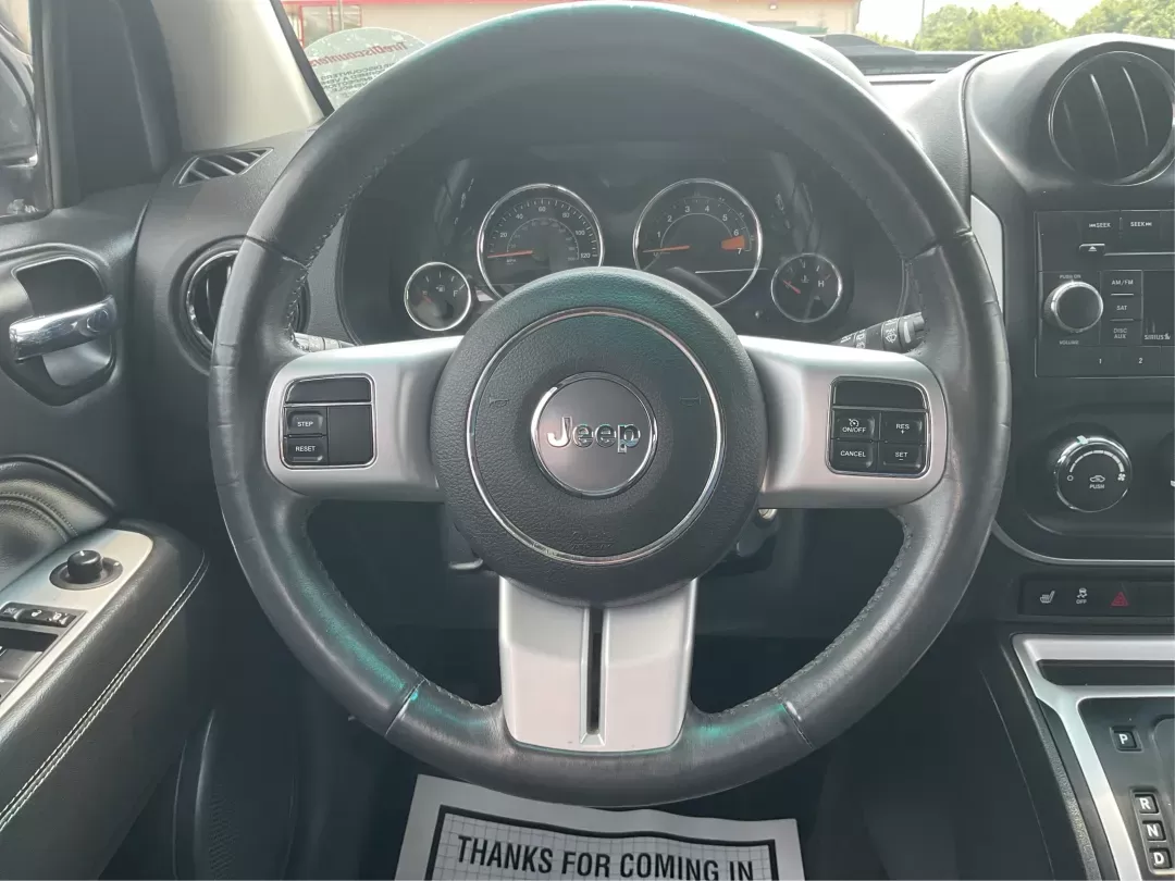 2016 Jeep Compass High Altitude Edition (1C4NJDEB2GD) with an 2.4L I-4 DOHC engine, located at 880 E. National Road, Vandalia, OH, 45377, (937) 908-9800, 39.891918, -84.183594 - Photo#14