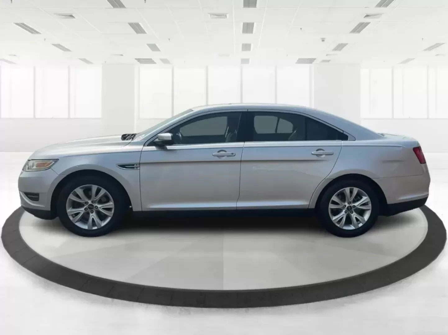 2011 Ford Taurus SEL (1FAHP2EW4BG) with an Duratec 3.5L V-6 DOHC engine, located at 401 Woodman Dr, Riverside, OH, 45431, (937) 908-9800, 39.760899, -84.123421 - 2011 Ford Taurus SEL - Photo#5