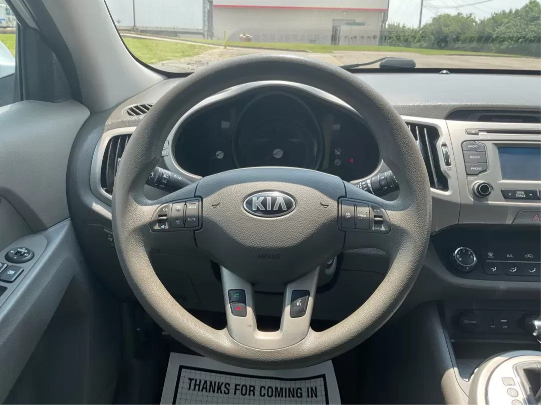 2016 Kia Sportage LX (KNDPBCACXG7) with an Theta II 2.4L I-4 gasoline direct injection engine, located at 401 Woodman Dr, Riverside, OH, 45431, (937) 908-9800, 39.760899, -84.123421 - 2016 Kia Sportage LX - Photo#15