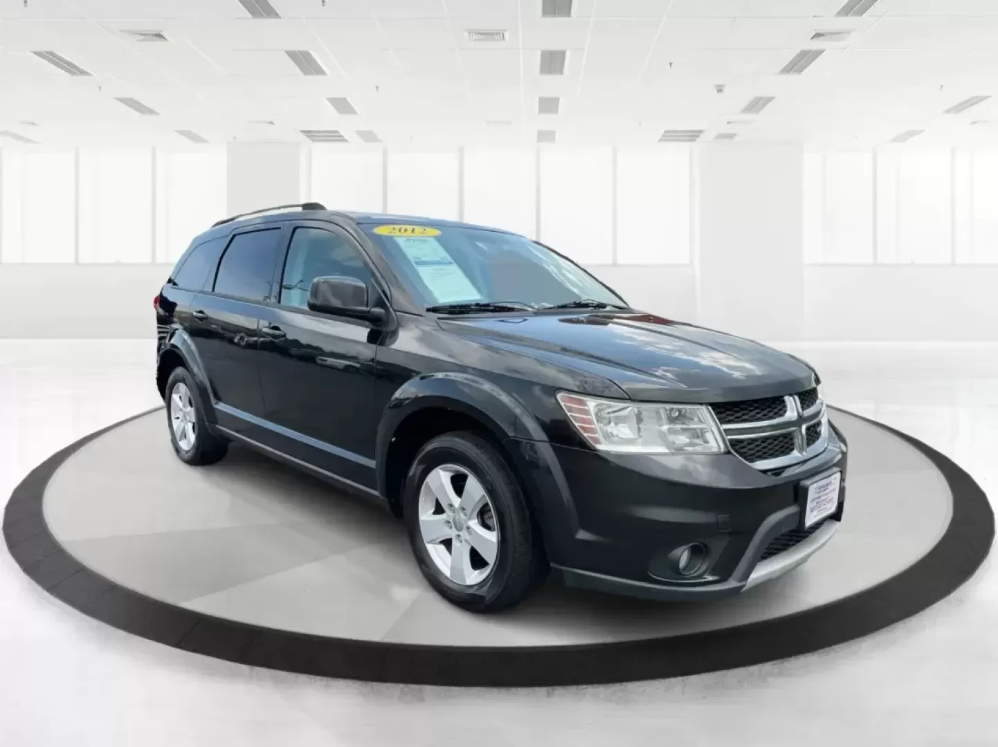 2012 Dodge Journey SXT (3C4PDCBG5CT) with an 2.4L I-4 DOHC engine, located at 401 Woodman Dr, Riverside, OH, 45431, (937) 908-9800, 39.760899, -84.123421 - 2012 Dodge Journey SXT - Photo#0