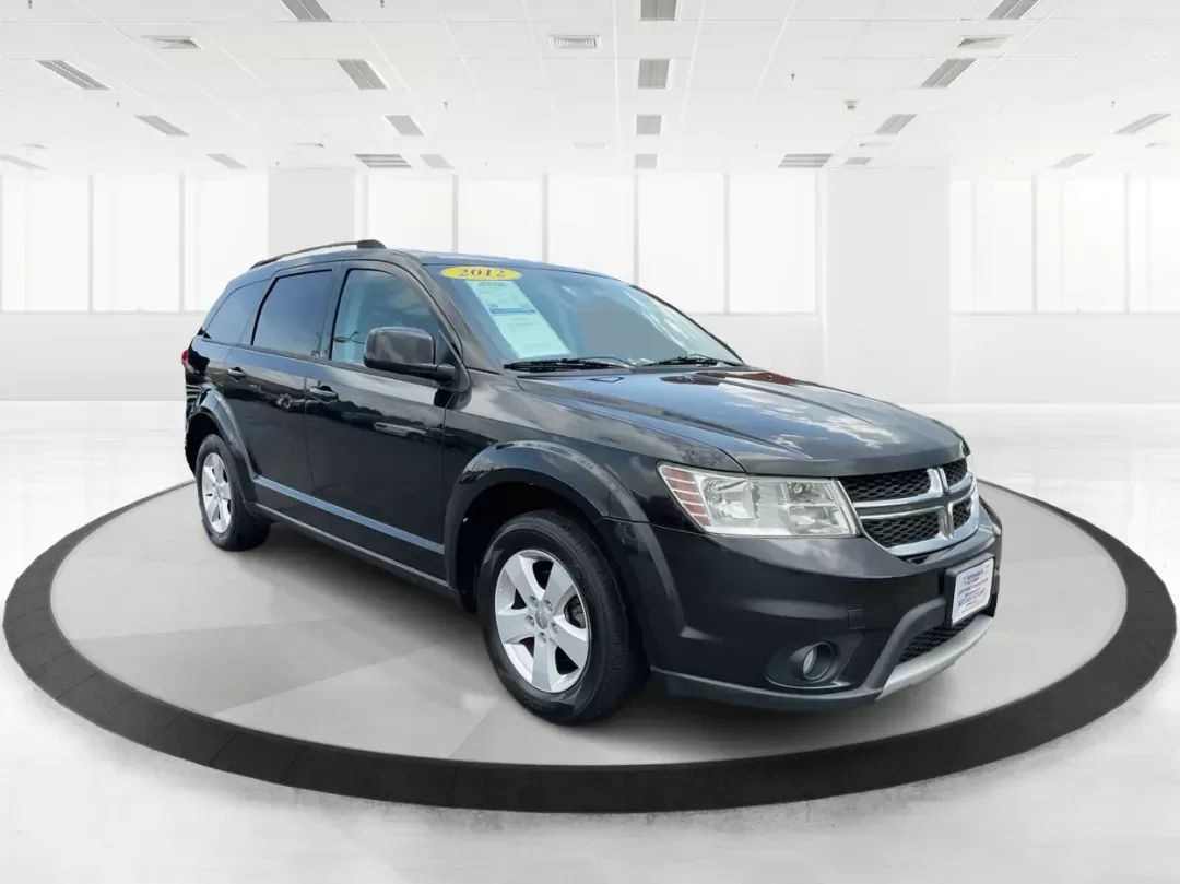 2012 Dodge Journey SXT (3C4PDCBG5CT) with an 2.4L I-4 DOHC engine, located at 401 Woodman Dr, Riverside, OH, 45431, (937) 908-9800, 39.760899, -84.123421 - Photo#0